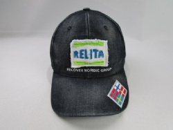 Washed denim baseball cap with custom woven badge